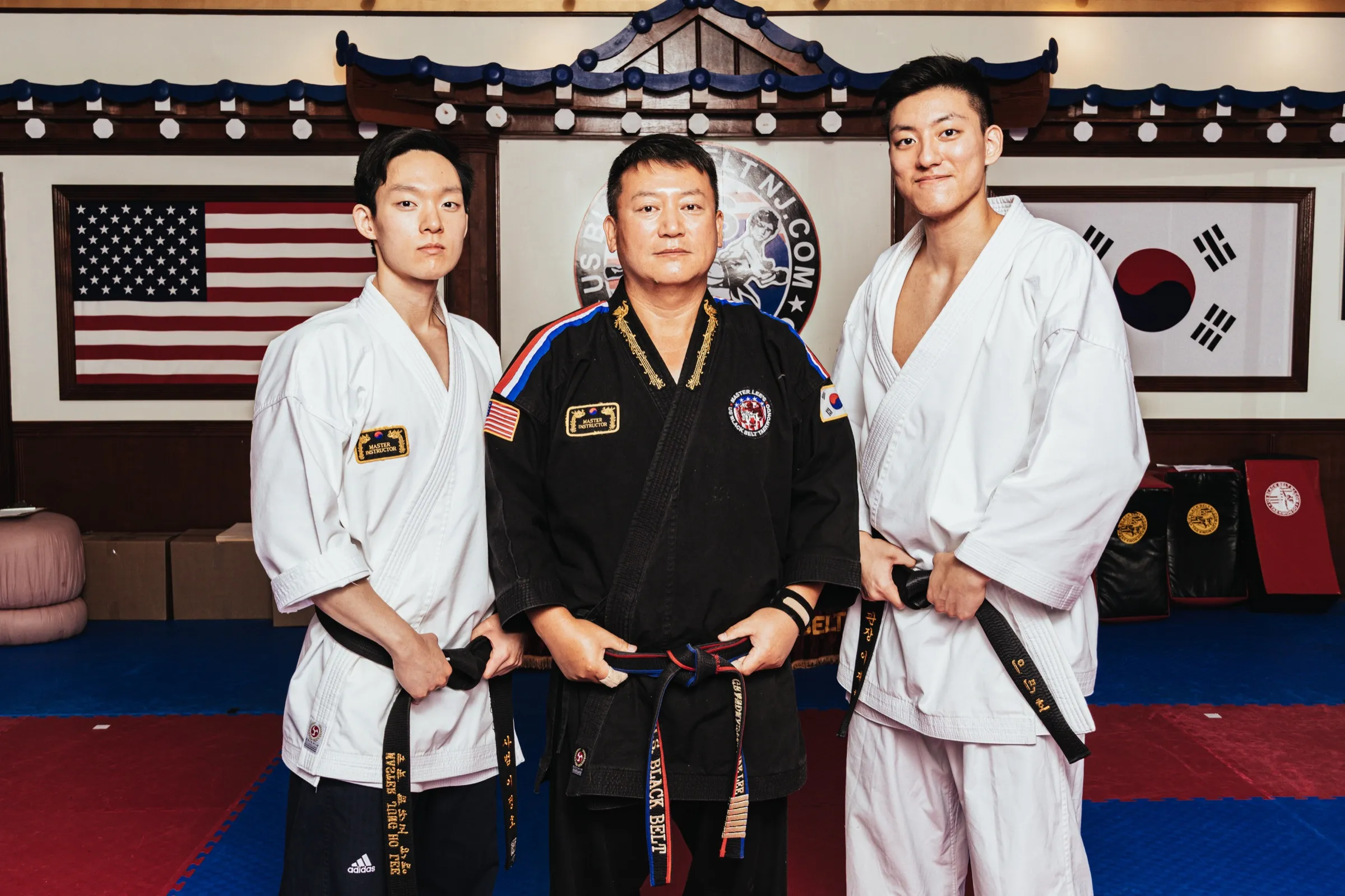 Grandmaster J. Lee with his sons, Master Jung and Master Minho