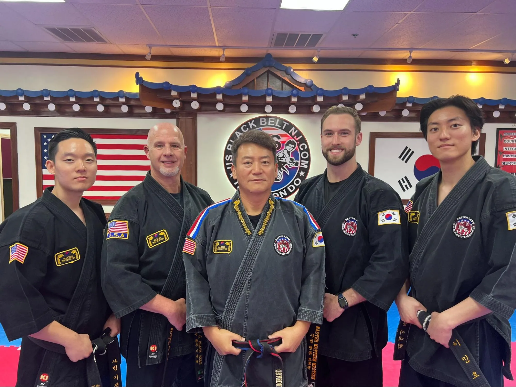 Grandmaster Lee, Master Jung and Master Minho Lee with Masters Michael and Matthew Mrotzek at the New Jersey academy